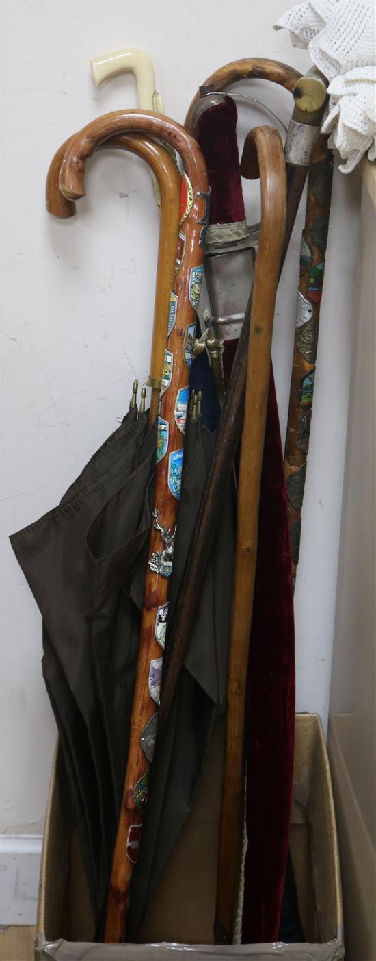 A sword and quantity of walking sticks